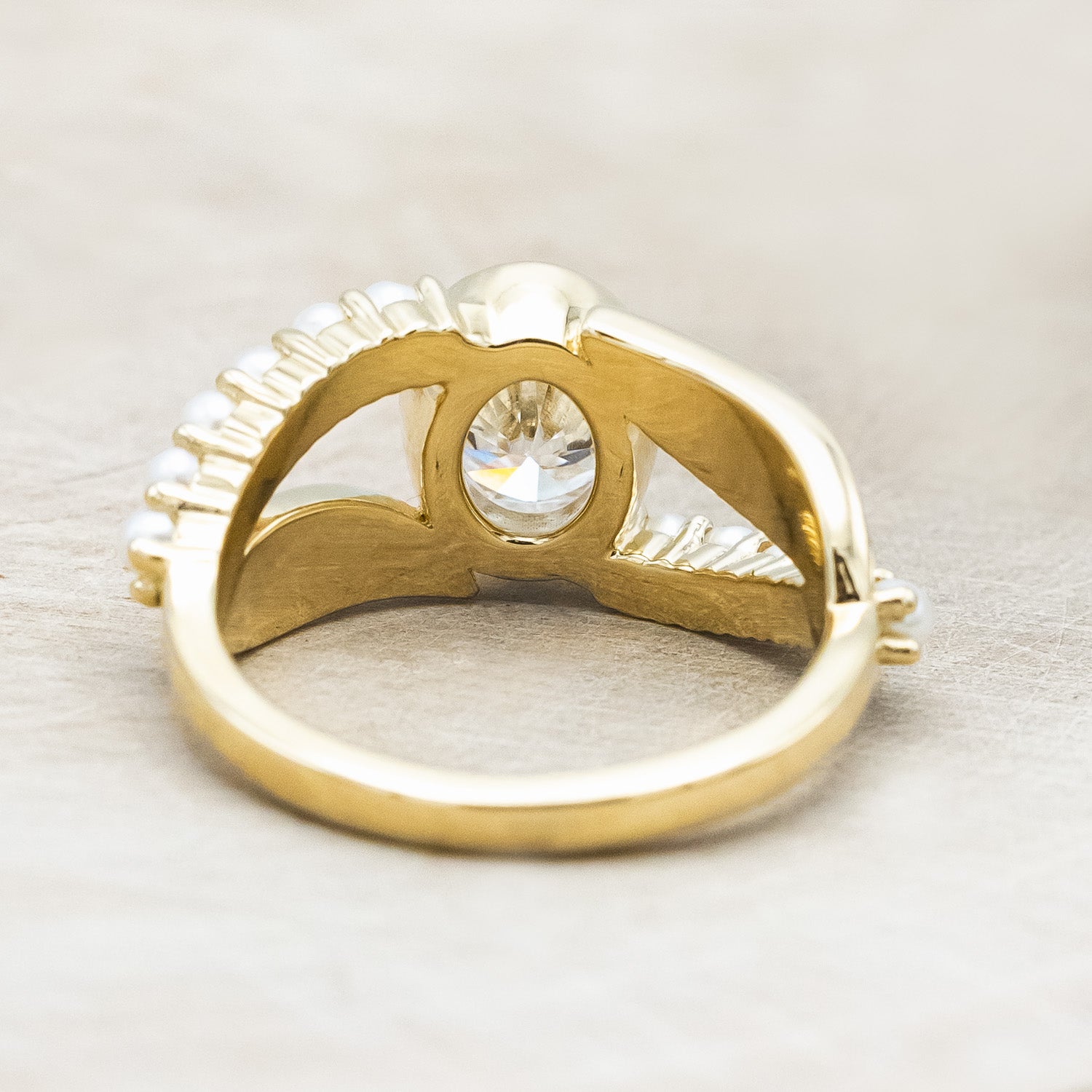 "Lily" an oval cut moissanite women's engagement ring with pearl accents