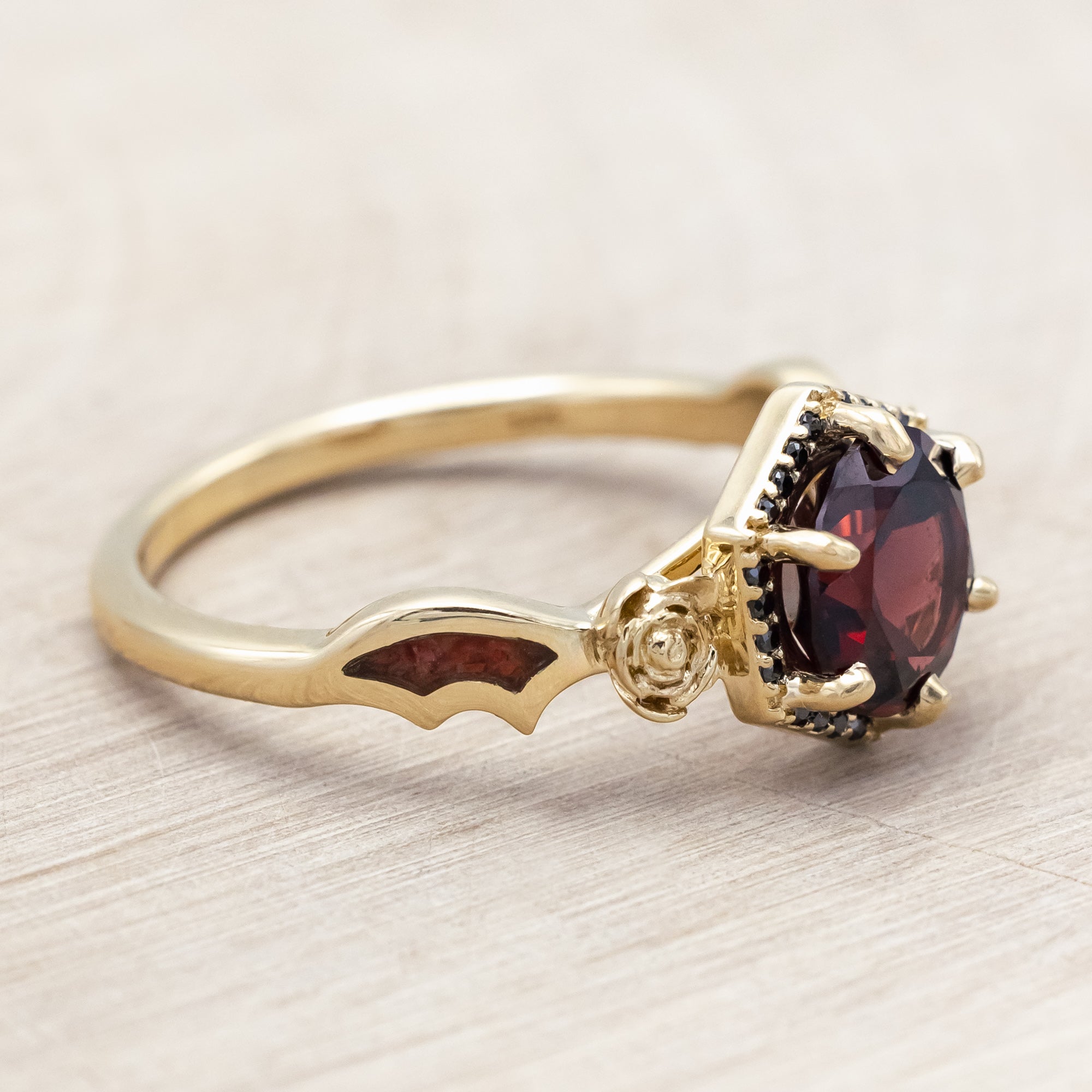 "LUCY IN THE SKY" - ROUND CUT GARNET ENGAGEMENT RING WITH BLACK DIAMONDS, ROSE ACCENTS & BAT WING SHAPED RED OPAL INLAYS-Staghead Designs