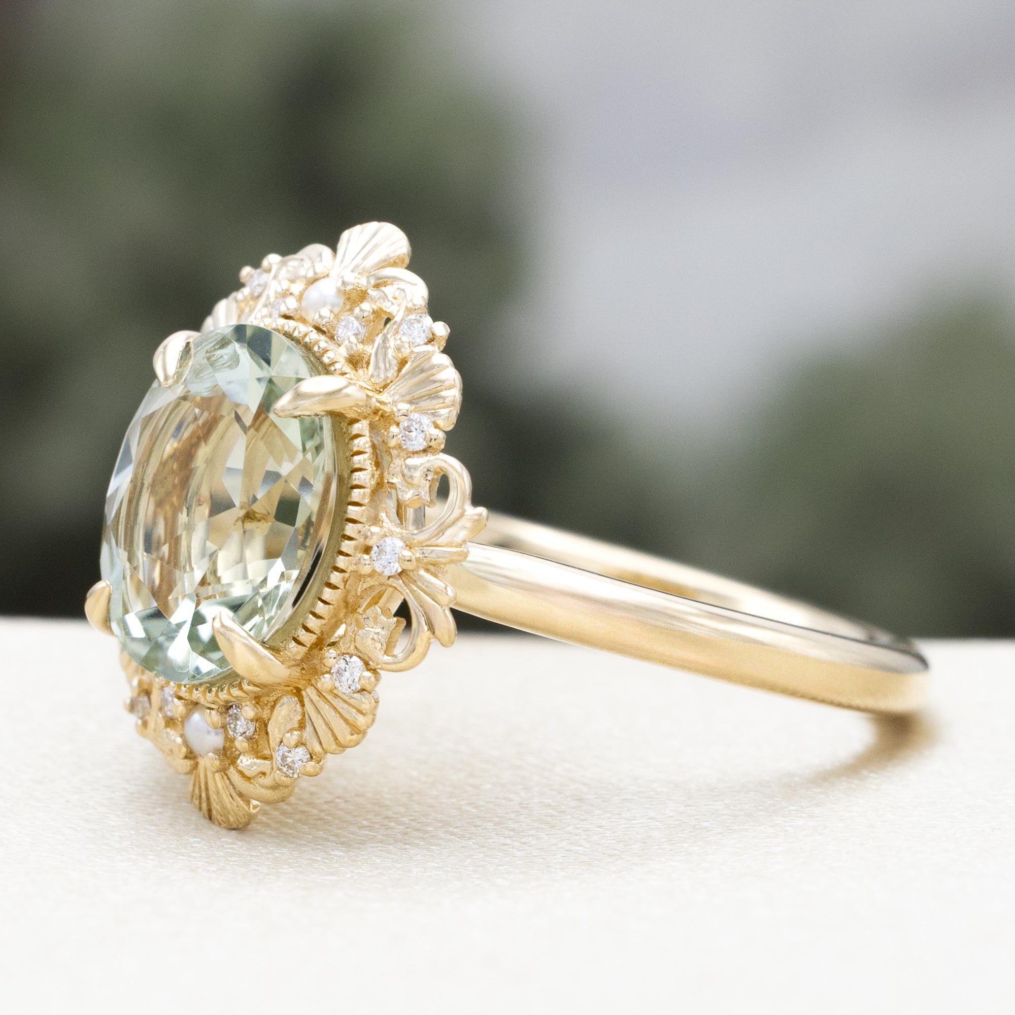 "MERROW" - OVAL CUT ENGAGEMENT RING WITH PEARL ACCENTS AND DIAMOND TRACER