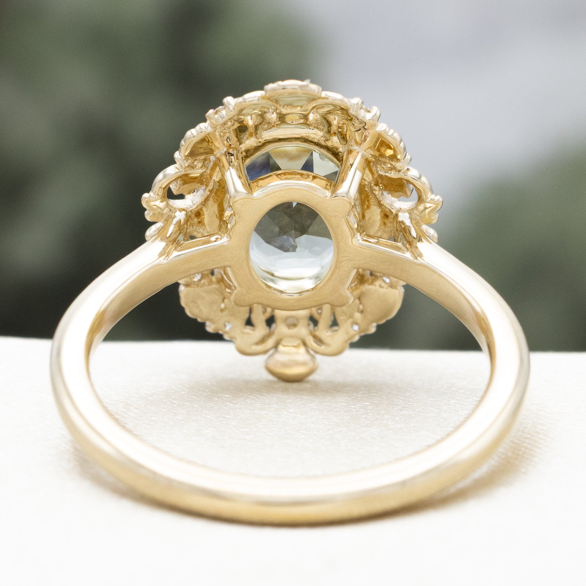 "MERROW" - OVAL CUT ENGAGEMENT RING WITH PEARL ACCENTS AND DIAMOND TRACER