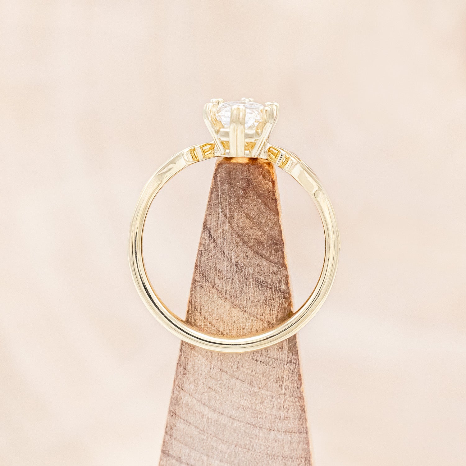 Top view of "Morrigan" - solitaire geo-cut diamond women's engagement ring on an ornate 14K yellow gold band