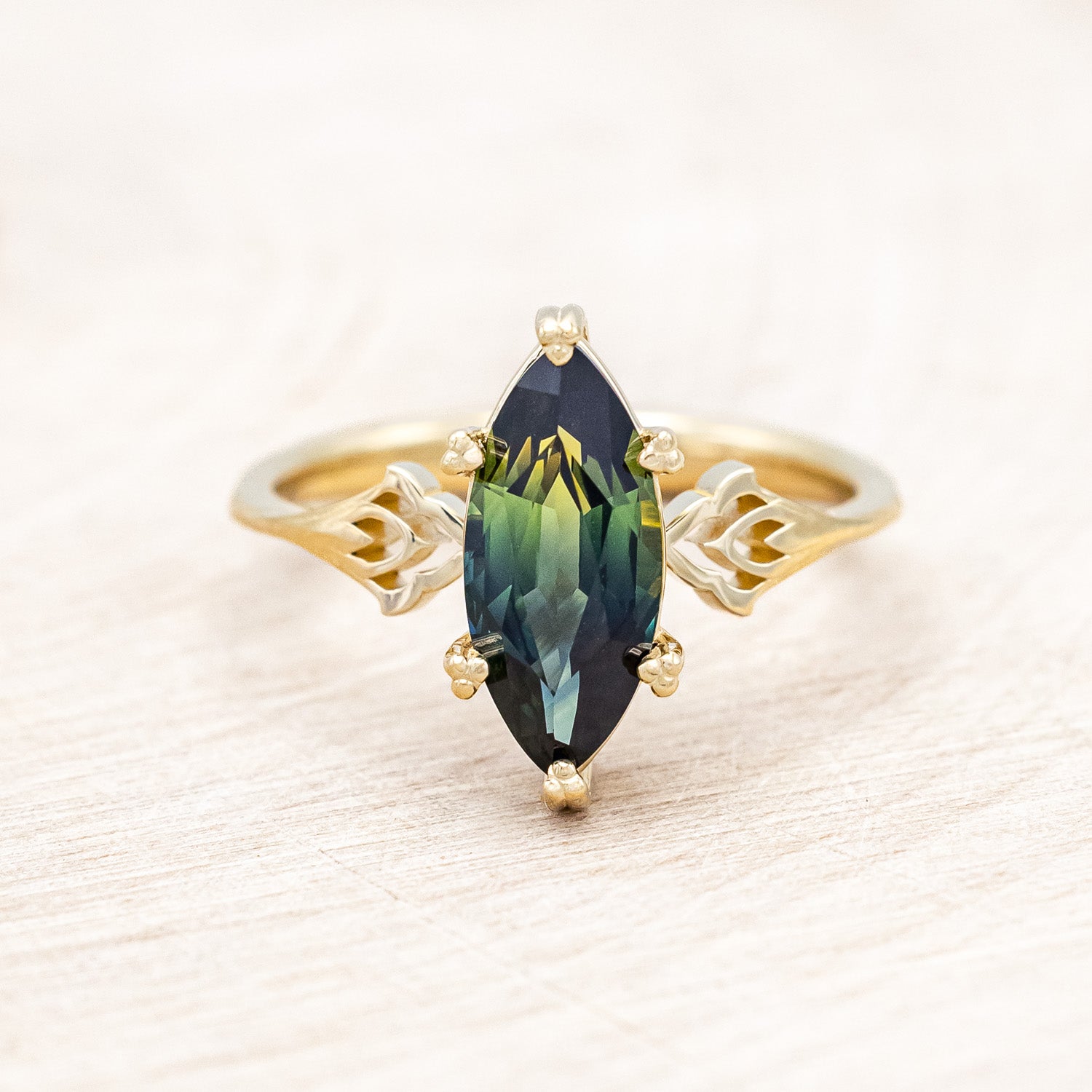 "Morrigan" - solitaire Australian sapphire women's engagement ring on an ornate 14K yellow gold band