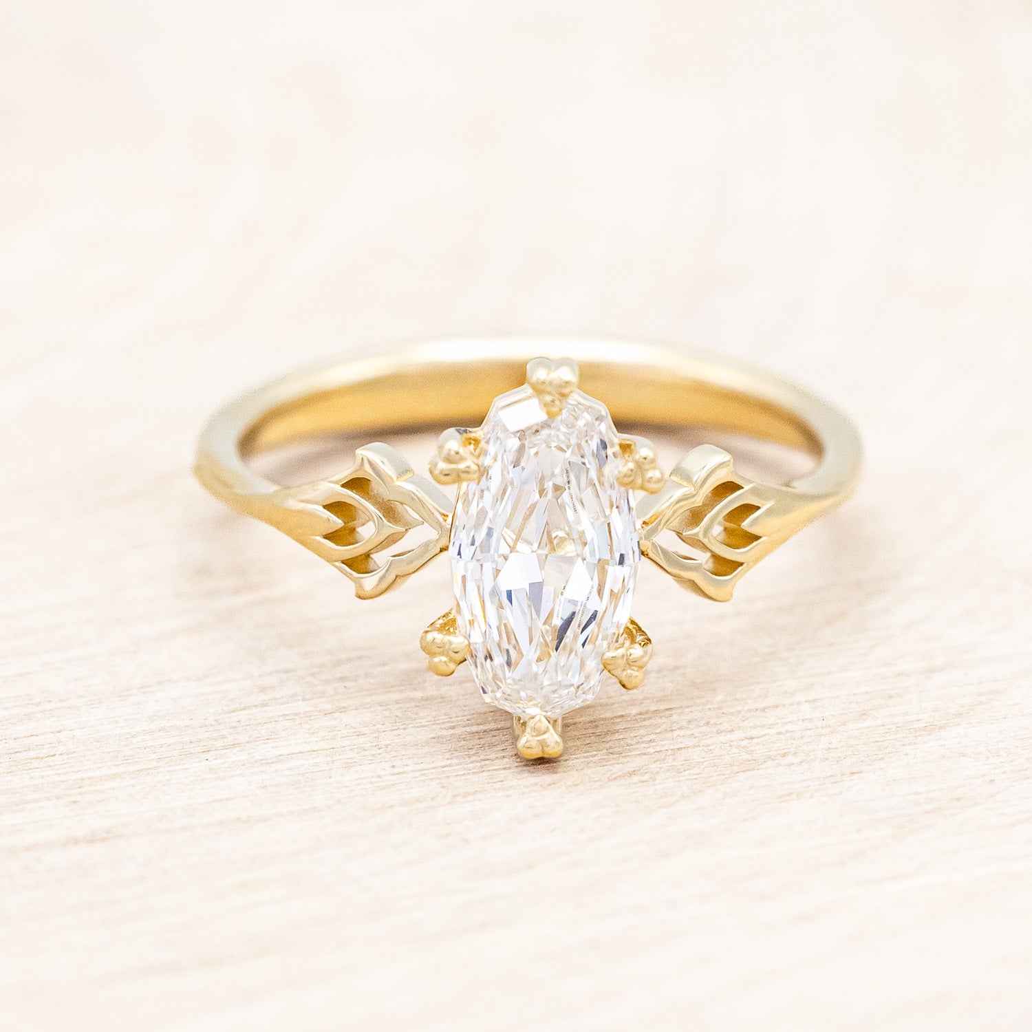"Morrigan" - solitaire geo-cut diamond women's engagement ring on an ornate 14K yellow gold band