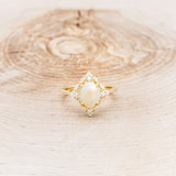 "NORTH STAR" - OVAL OPAL CABOCHON ENGAGEMENT RING WITH DIAMOND HALO