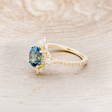 "NORTH STAR" - OVAL MONTANA SAPPHIRE ENGAGEMENT RING WITH DIAMOND HALO & ACCENTS