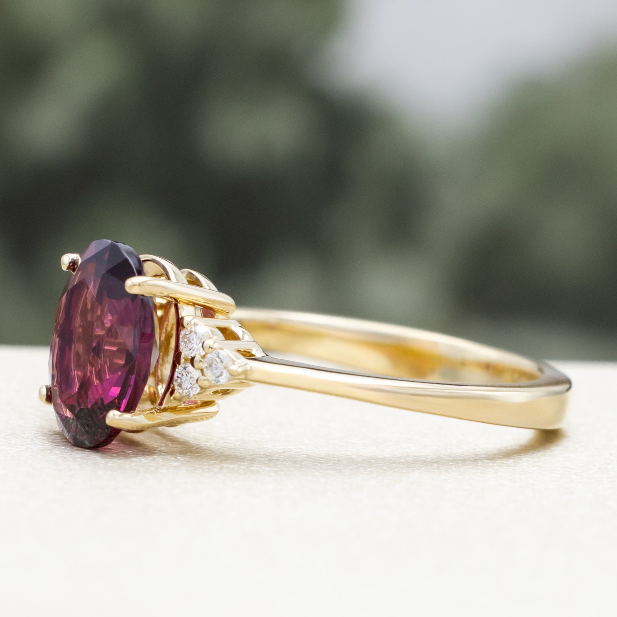 "RHEA" - OVAL CUT RHODOLITE GARNET ENGAGEMENT RING WITH DIAMOND ACCENTS-Staghead Designs