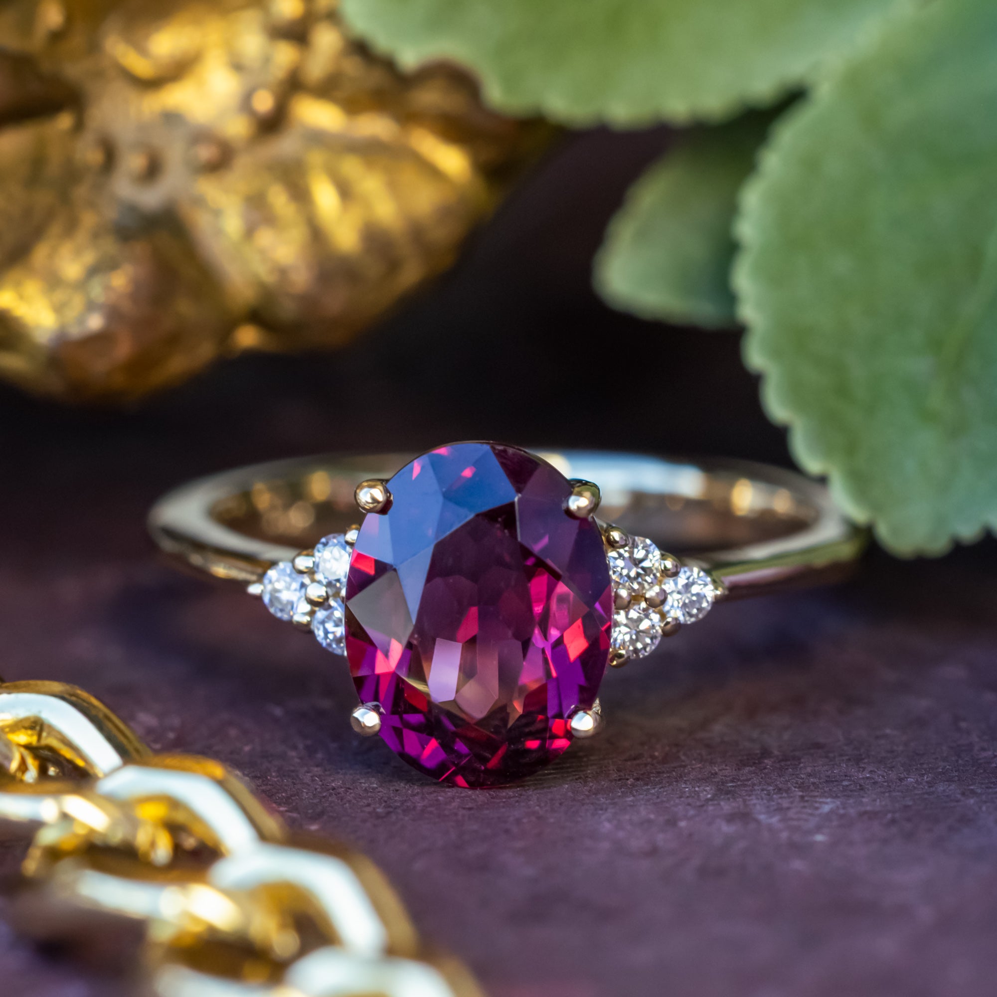 "RHEA" - OVAL CUT RHODOLITE GARNET ENGAGEMENT RING WITH DIAMOND ACCENTS-Staghead Designs