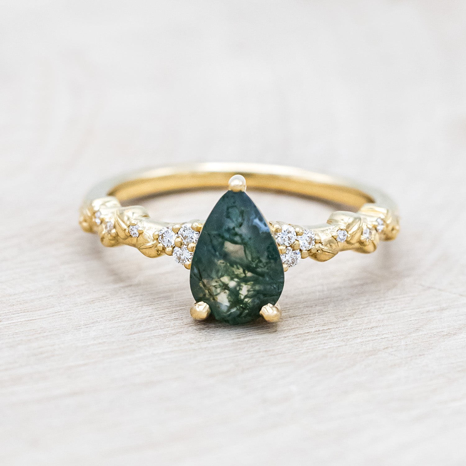 "Lynette" - pear cut moss agate women's engagement ring with diamond accents on leaf band