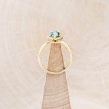 "LAVERNA" - PEAR-SHAPED TURQUOISE ENGAGEMENT RING WITH DIAMOND HALO