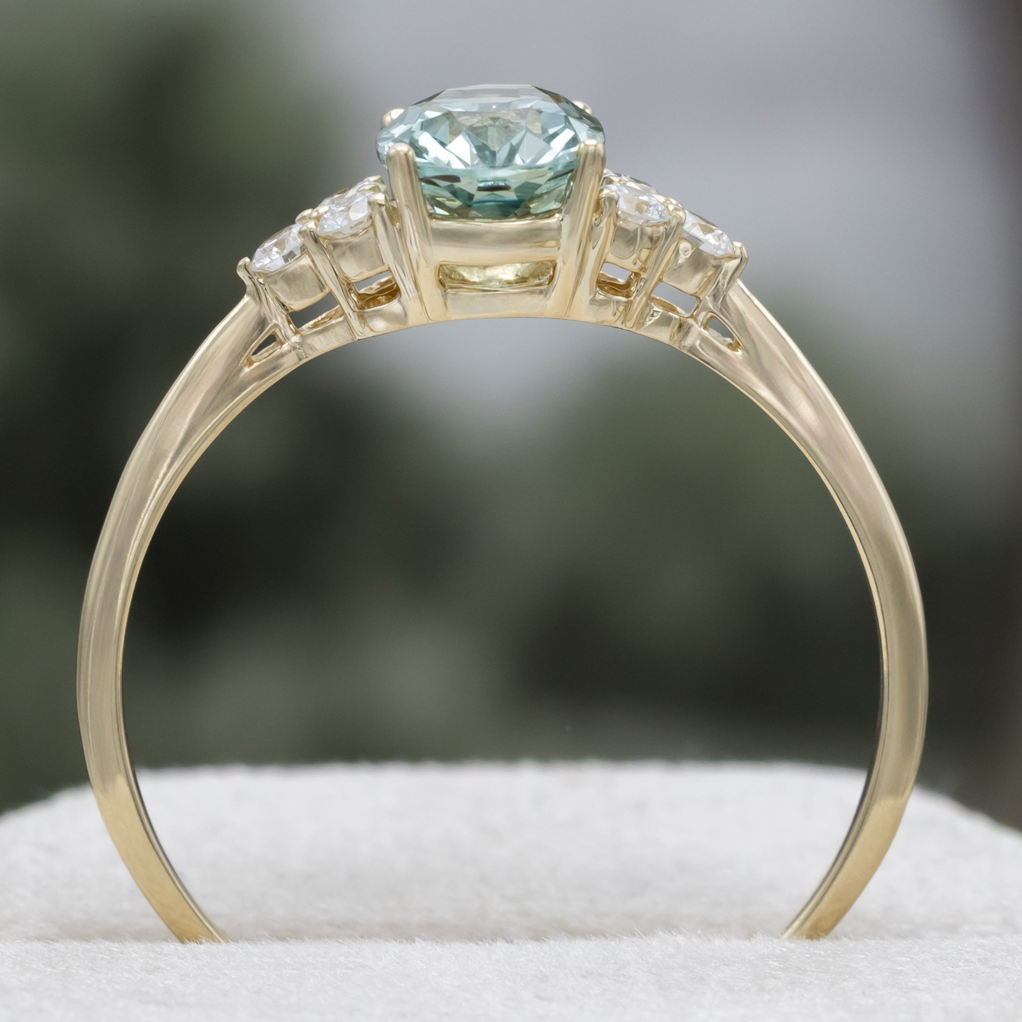 "Rhea" - Oval Cut Lab-Grown Green Sapphire Engagement Ring With Diamond Accents