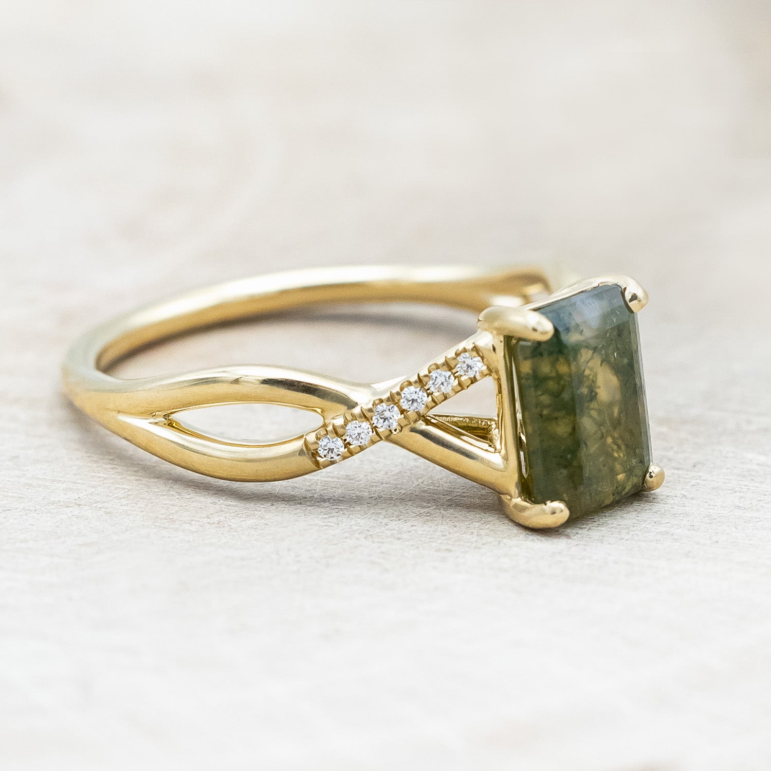 Side view of "Roslyn" - emerald cut moss agate women's engagement ring with diamond accents