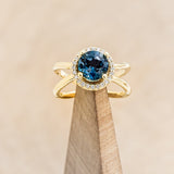 ROUND CUT BLUE TOPAZ ENGAGEMENT RING WITH DIAMOND HALO