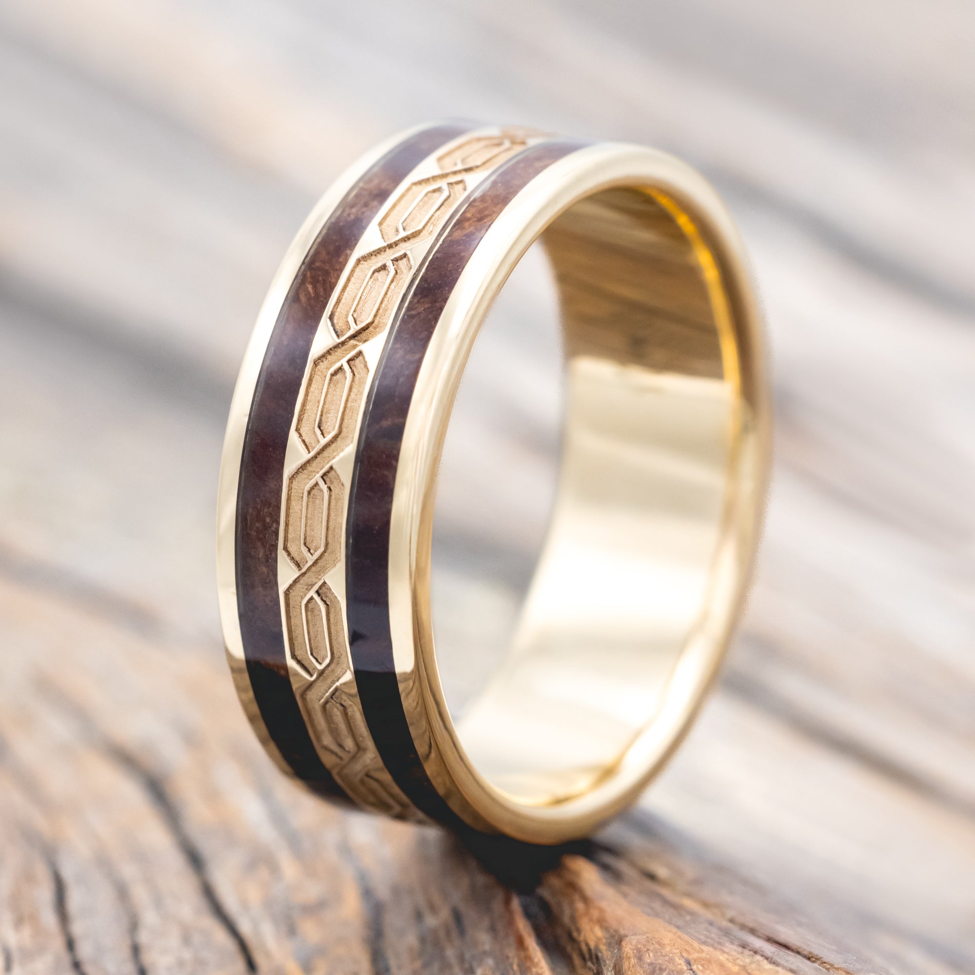 14K gold right with Celtic engravings and redwood inlays