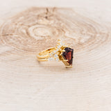 "SAGE" - KITE CUT GARNET ENGAGEMENT RING WITH DIAMOND ACCENTS & DIAMOND TRACER