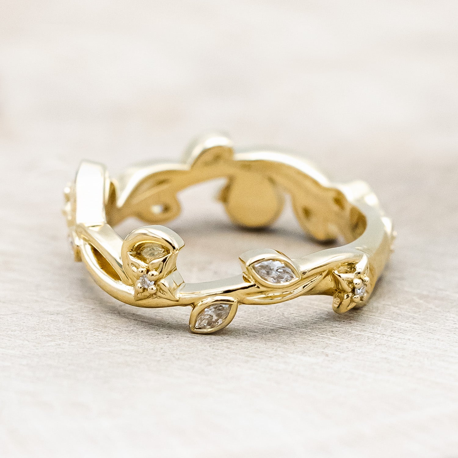Side view of "Elowen" - sculptural-style vine & floral filigree band with diamond accents