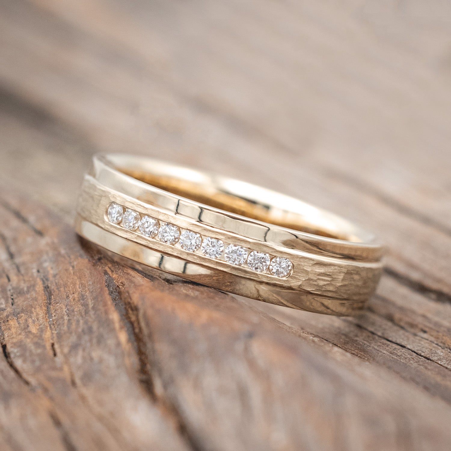"Sedona" - men's wedding ring featuring a raised, hammered center with diamond accents