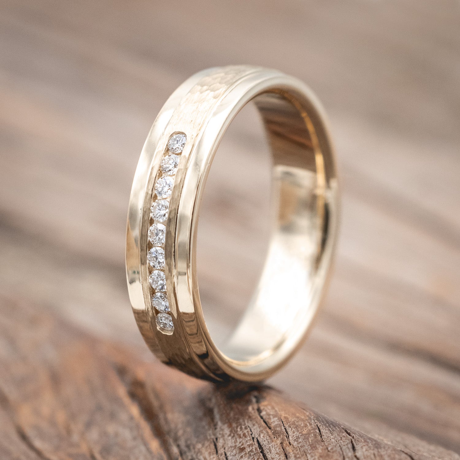 "Sedona" - men's wedding ring featuring a raised, hammered center with diamond accents