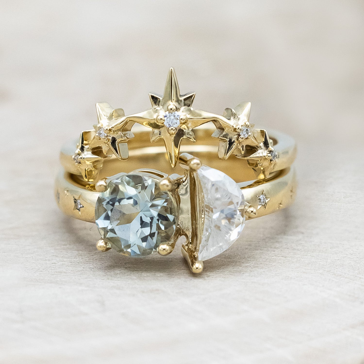 Front view of "Sidra" - toi et moi round cut green prasiolite women's engagement ring with a crescent moon moissanite accent, and celestial style diamond tracer