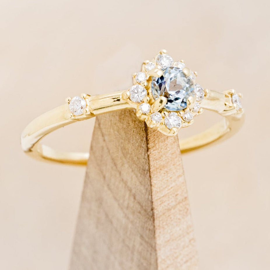"STARLA" - ROUND CUT AQUAMARINE ENGAGEMENT RING WITH STARBURST DIAMOND HALO & TRACER-6
