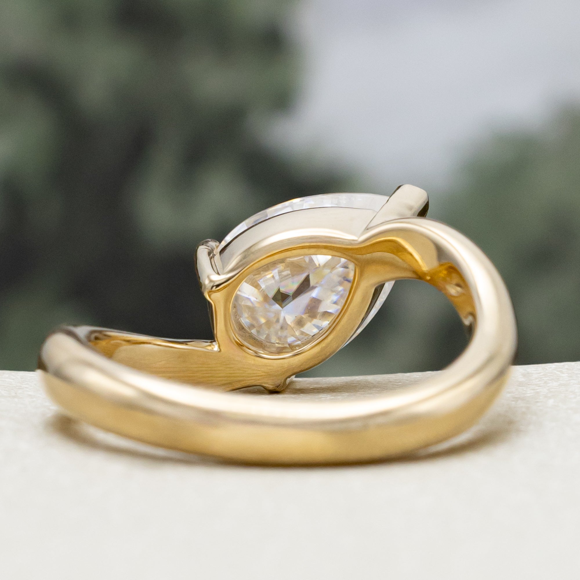 "SYBIL" - PEAR CUT MOISSANITE ASYMMETRICAL ENGAGEMENT RING WITH A GREEN TOURMALINE ACCENTED TRACER-Staghead Designs