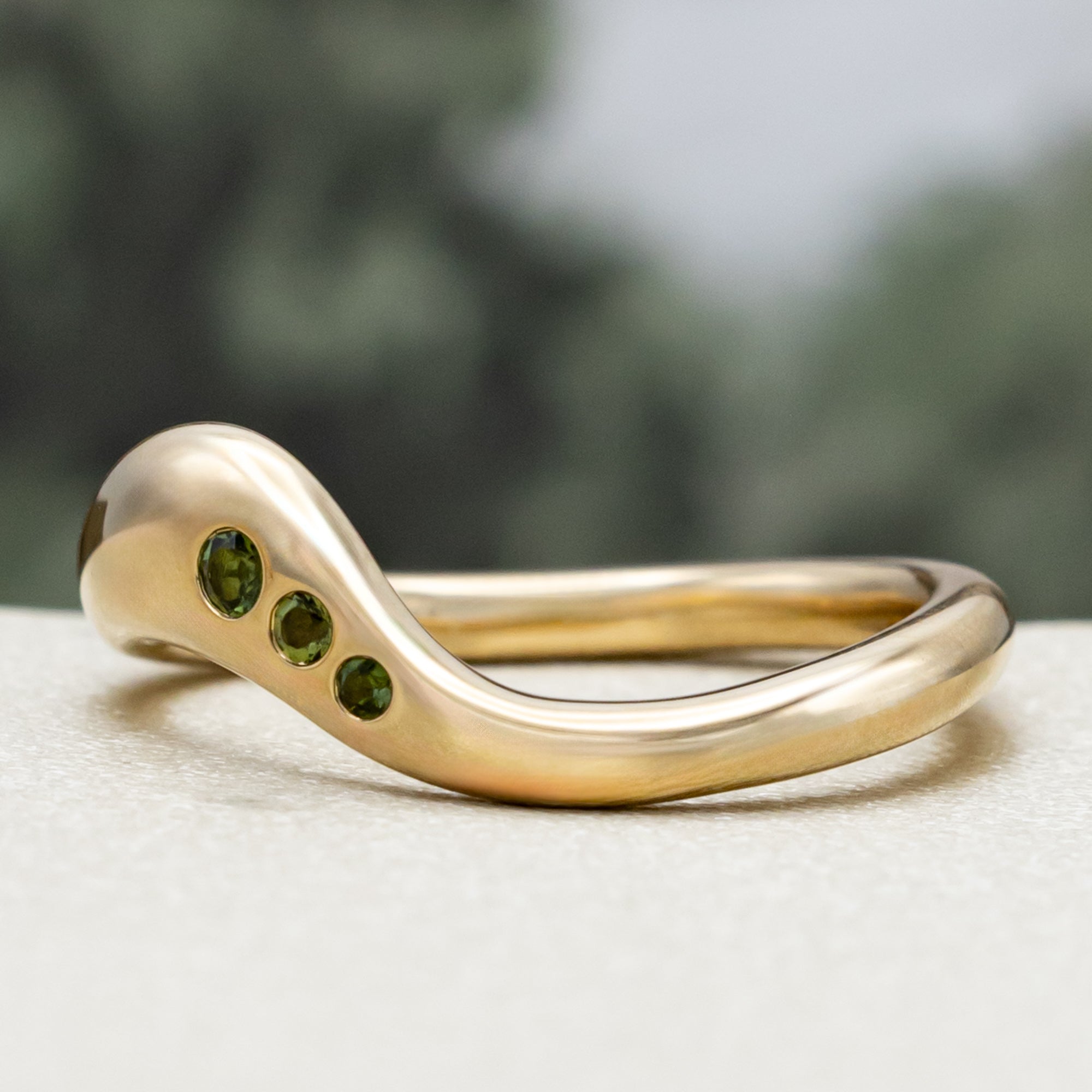 "SYBIL" - PEAR CUT MOISSANITE ASYMMETRICAL ENGAGEMENT RING WITH A GREEN TOURMALINE ACCENTED TRACER-Staghead Designs