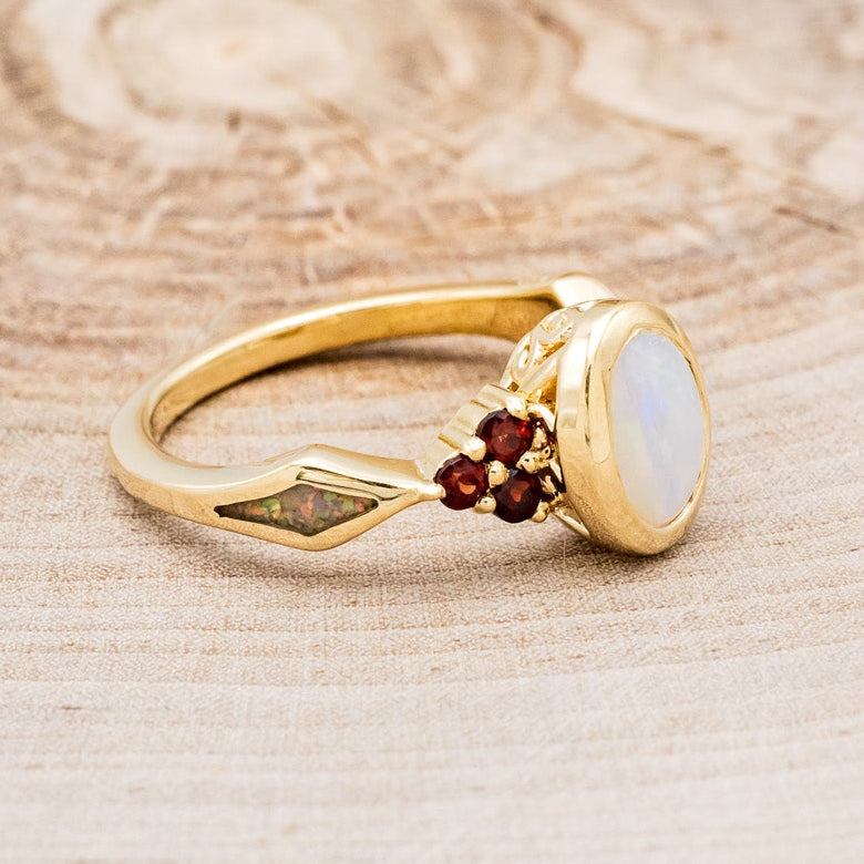 "AGATHA" - BEZEL SET OVAL CABOCHON CUT WHITE OPAL ENGAGEMENT RING WITH GARNET ACCENTS AND FIRE & ICE OPAL INLAYS-Staghead Designs