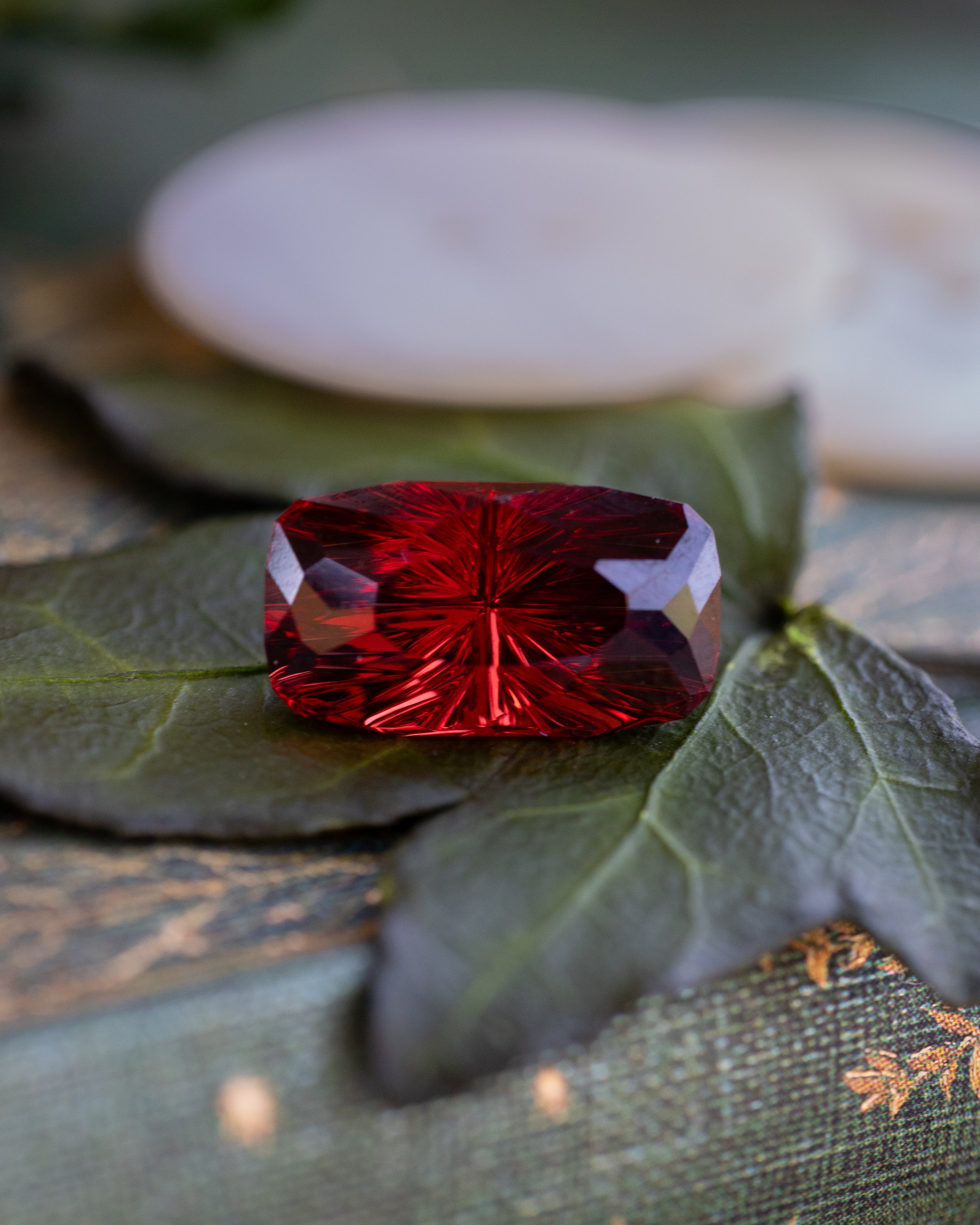 5.94ct 13x7.23x6.79mm Starbrite Cut Gypsy Rose Garnet-Staghead Designs