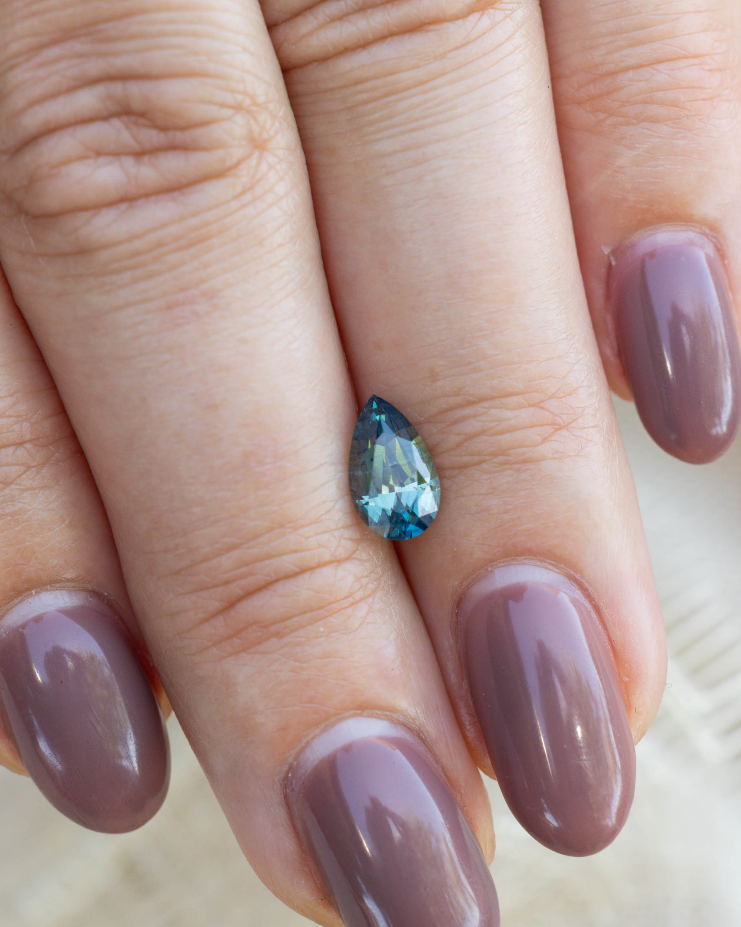 1.4ct 9.14x5.49x3.85mm Pear Cut Blue-Green Sapphire-Staghead Designs