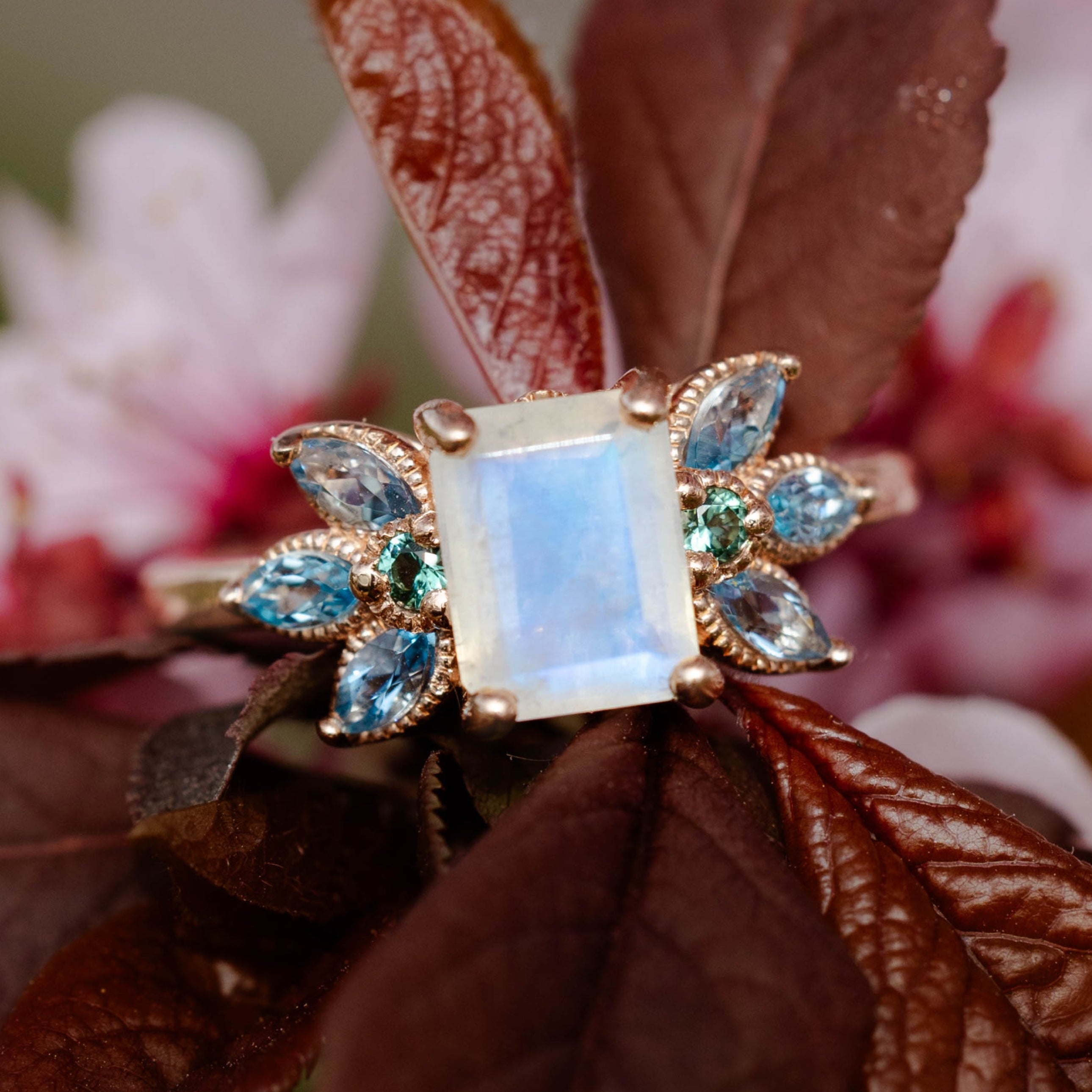 "MOONSHADOW" - EMERALD CUT MOONSTONE ENGAGEMENT RING WITH GREEN TOURMALINE & AQUAMARINE ACCENTS-Staghead Designs
