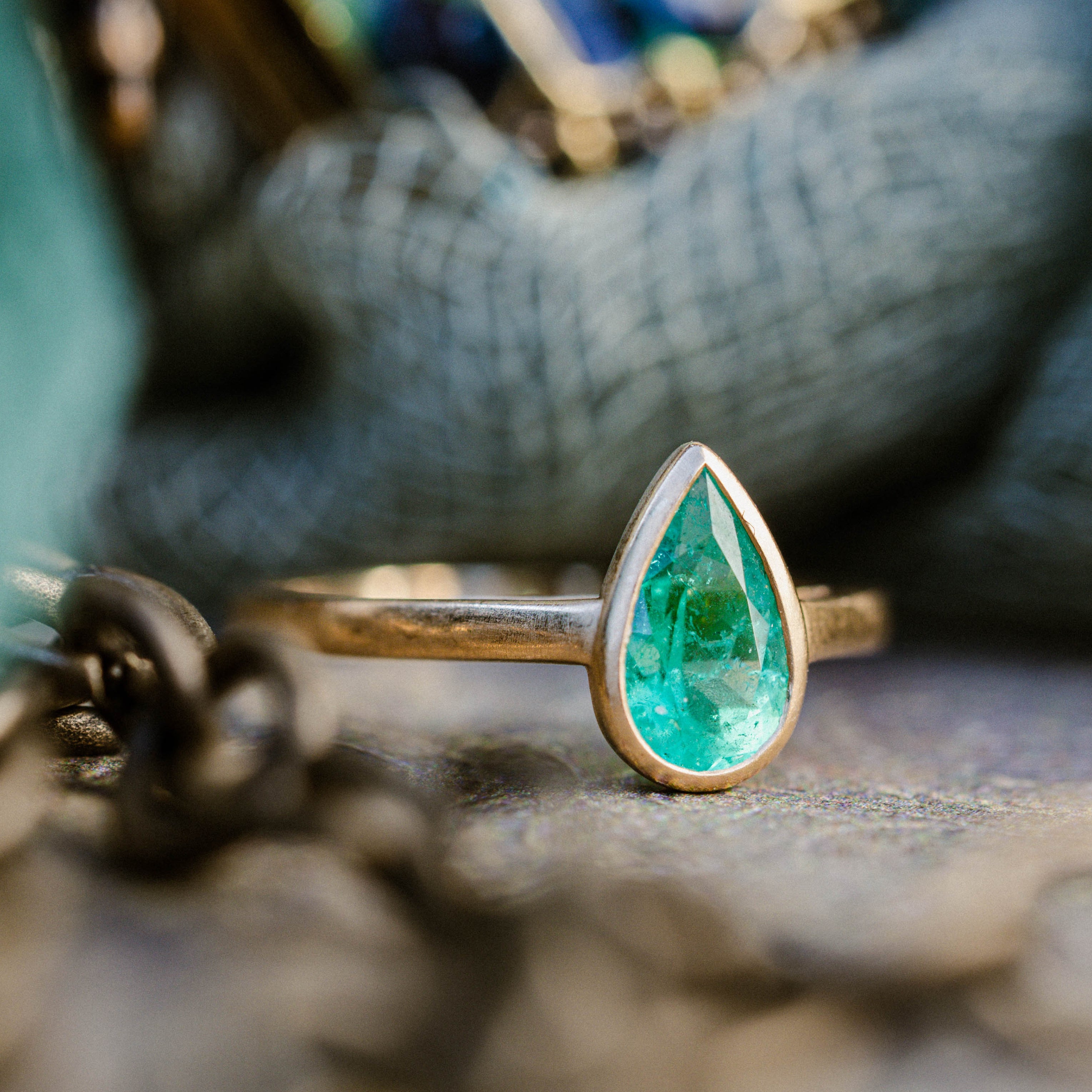 ONE-OF-A-KIND - "CLIO" - BEZEL-SET SOLITAIRE ENGAGEMENT RING WITH PEAR CUT NATURAL EMERALD ON A BRUSHED 18K GOLD BAND-Staghead Designs