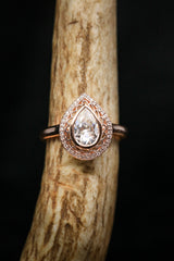 "PAYSLEE" - PEAR-SHAPED MOISSANITE ENGAGEMENT RING WITH DIAMOND HALO