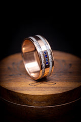 Shown here is  A custom, handcrafted men's wedding ring featuring antler inlays and 4 sapphires. Additional inlay options are available upon request.-Unique 14K Wedding Band Featuring Sapphire And Antler - Staghead Designs