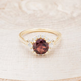 "OPHELIA" - ROUND CUT GARNET ENGAGEMENT RING WITH DIAMOND HALO, ACCENTS & DIAMOND TRACER
