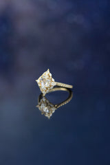 "NORTH STAR" - OVAL MOISSANITE ENGAGEMENT RING WITH DIAMOND HALO & ACCENTS