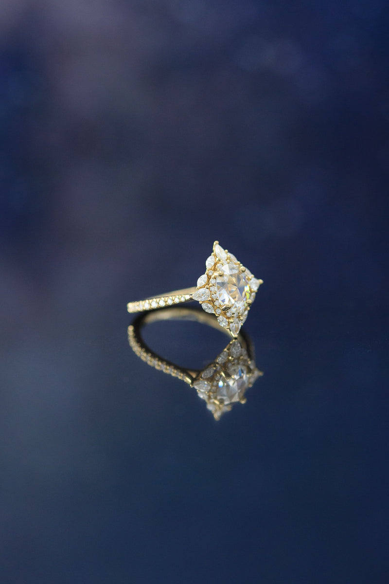 "NORTH STAR" - OVAL MOISSANITE ENGAGEMENT RING WITH DIAMOND HALO & ACCENTS