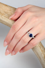 "AURA" - BIRTHSTONE RING WITH A LAB-GROWN BLUE SAPPHIRE CENTER STONE & DIAMOND ACCENTS