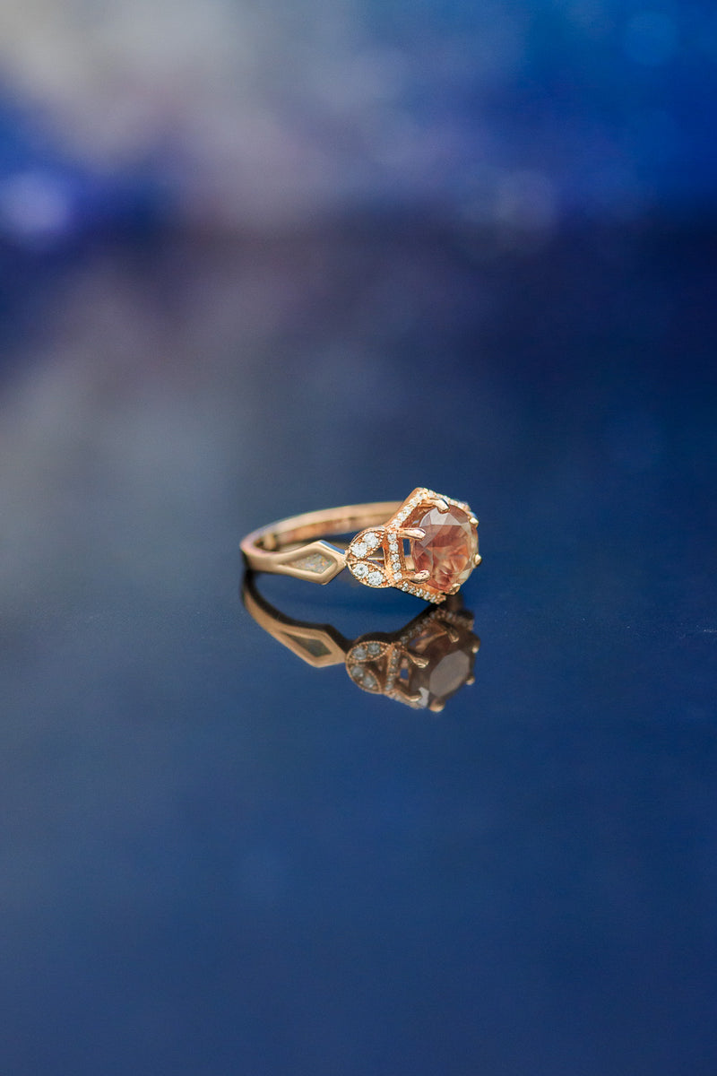"LUCY IN THE SKY" - ROUND CUT OREGON SUNSTONE ENGAGEMENT RING WITH DIAMOND HALO AND FIRE & ICE OPAL INLAYS