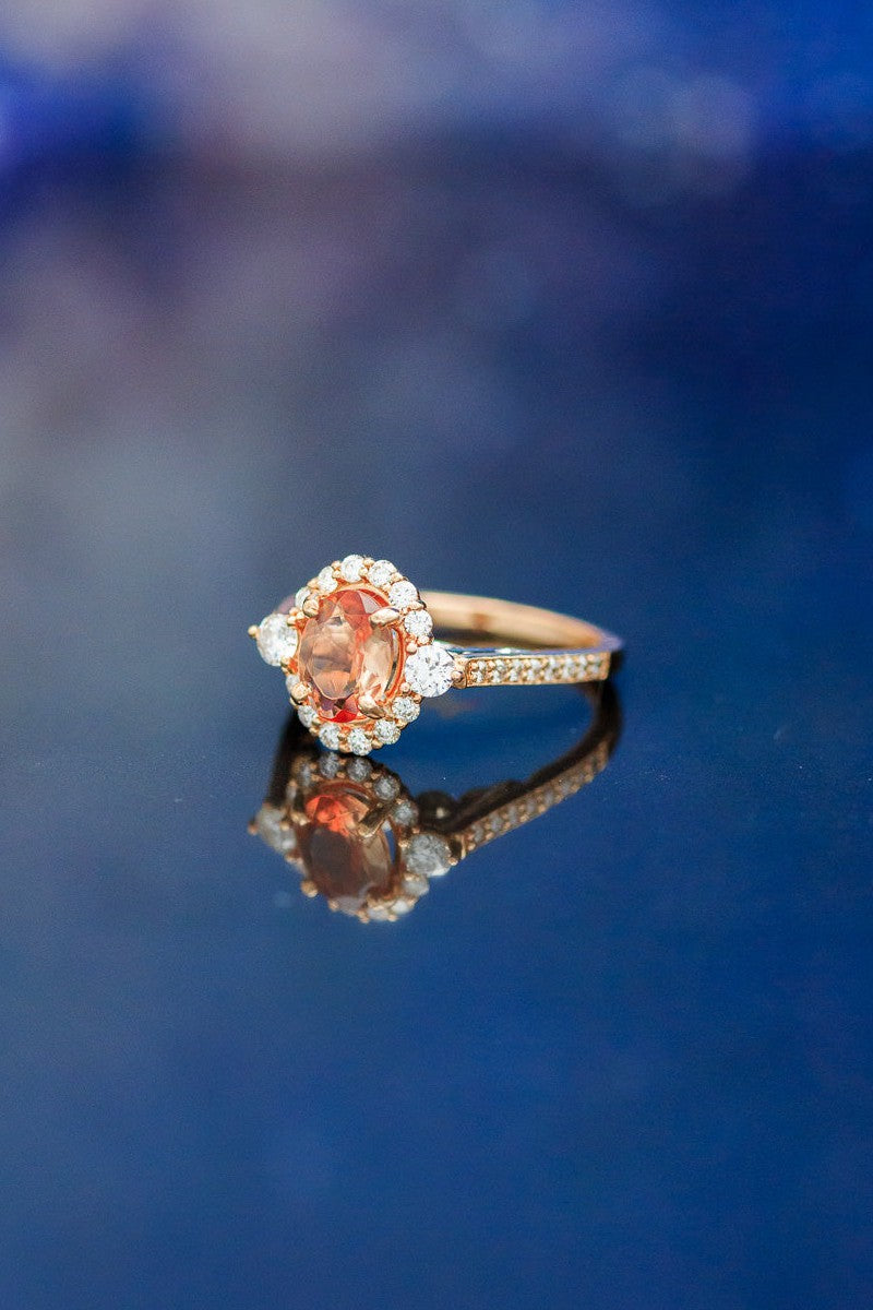  Shown here is The "Ophelia", a halo-style oval sunstone women's engagement ring with delicate and ornate details and is available with many center stone options-14K Gold Engagement Ring With a Sunstone and Diamond Accents - Staghead Designs