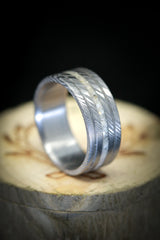  shown here is a Custom, handcrafted men's wedding ring featuring a centered elk antler inlay. Additional inlay options are available upon request.