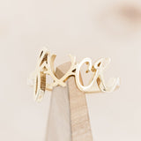 "EFFIE" - SCRIPT-STYLE BREAST CANCER AWARENESS RING - 14K YELLOW GOLD - SIZE 6 1/4