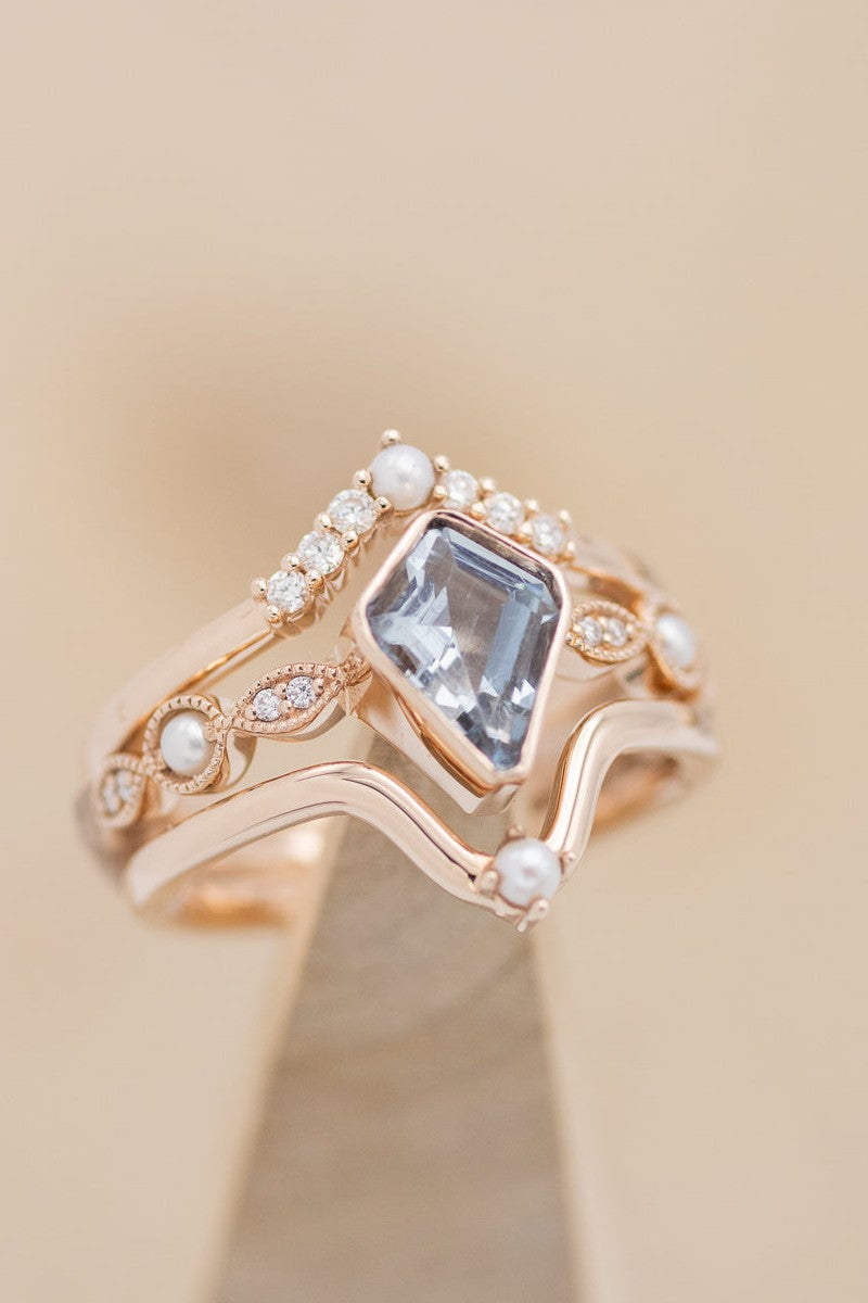  Shown here is The "Bianca", an accented-style aquamarine women's engagement ring with delicate and ornate details and is available with many center stone options -14K Gold Engagement Ring With Aquamarine Center Stone, Diamond & Pearl Accents - Staghead Designs