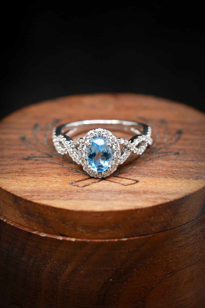 Shown here is an accented-style aquamarine women's engagement ring with delicate and ornate details and is available with many center stone options
