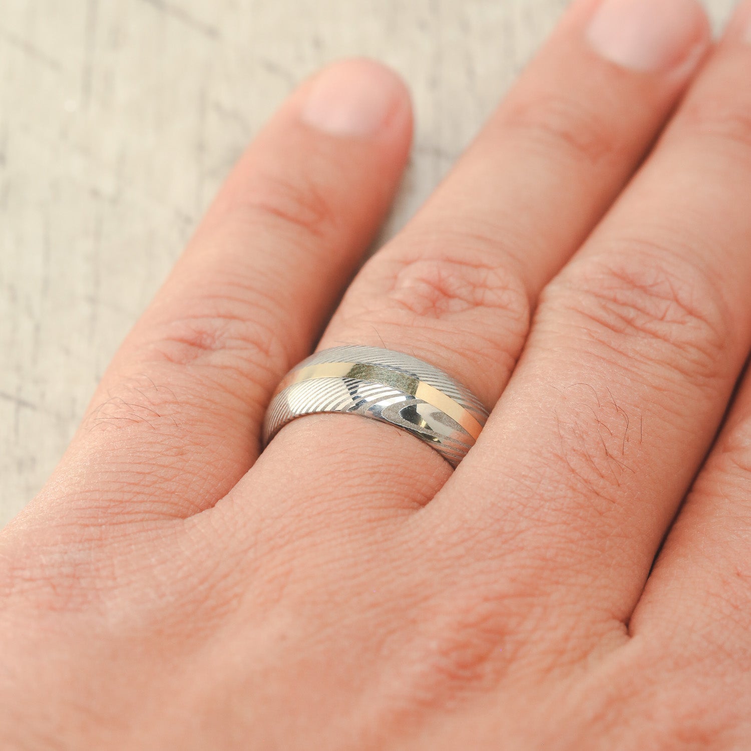 "NIRVANA" - DOMED DAMASCUS STEEL WEDDING RING WITH A 14K GOLD INLAY-8