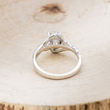 "SCARLET" - PEAR-SHAPED MOISSANITE ENGAGEMENT RING WITH DIAMOND ACCENTS