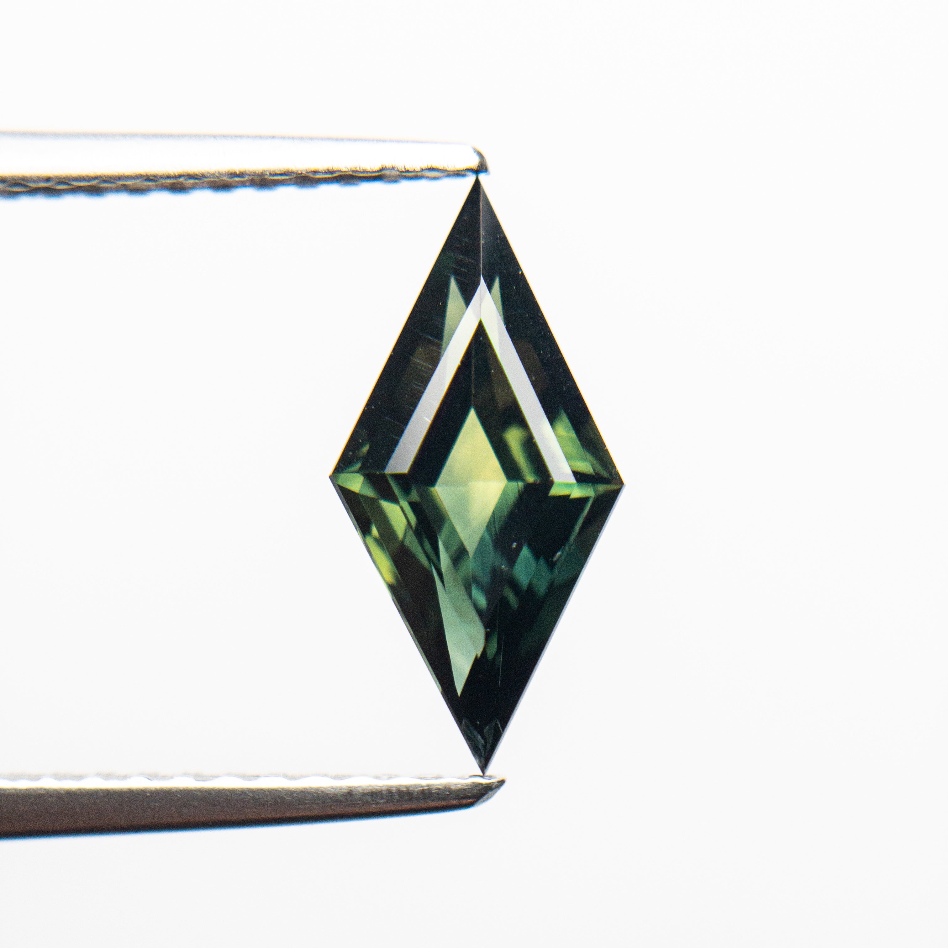 1.36ct 11.94x5.89x3.61mm Lozenge Step Cut Sapphire 22766-02-Staghead Designs