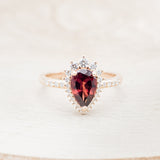 "LAVERNA LUX" - PEAR- SHAPED GARNET ENGAGEMENT RING WITH DIAMOND HALO & ACCENTS