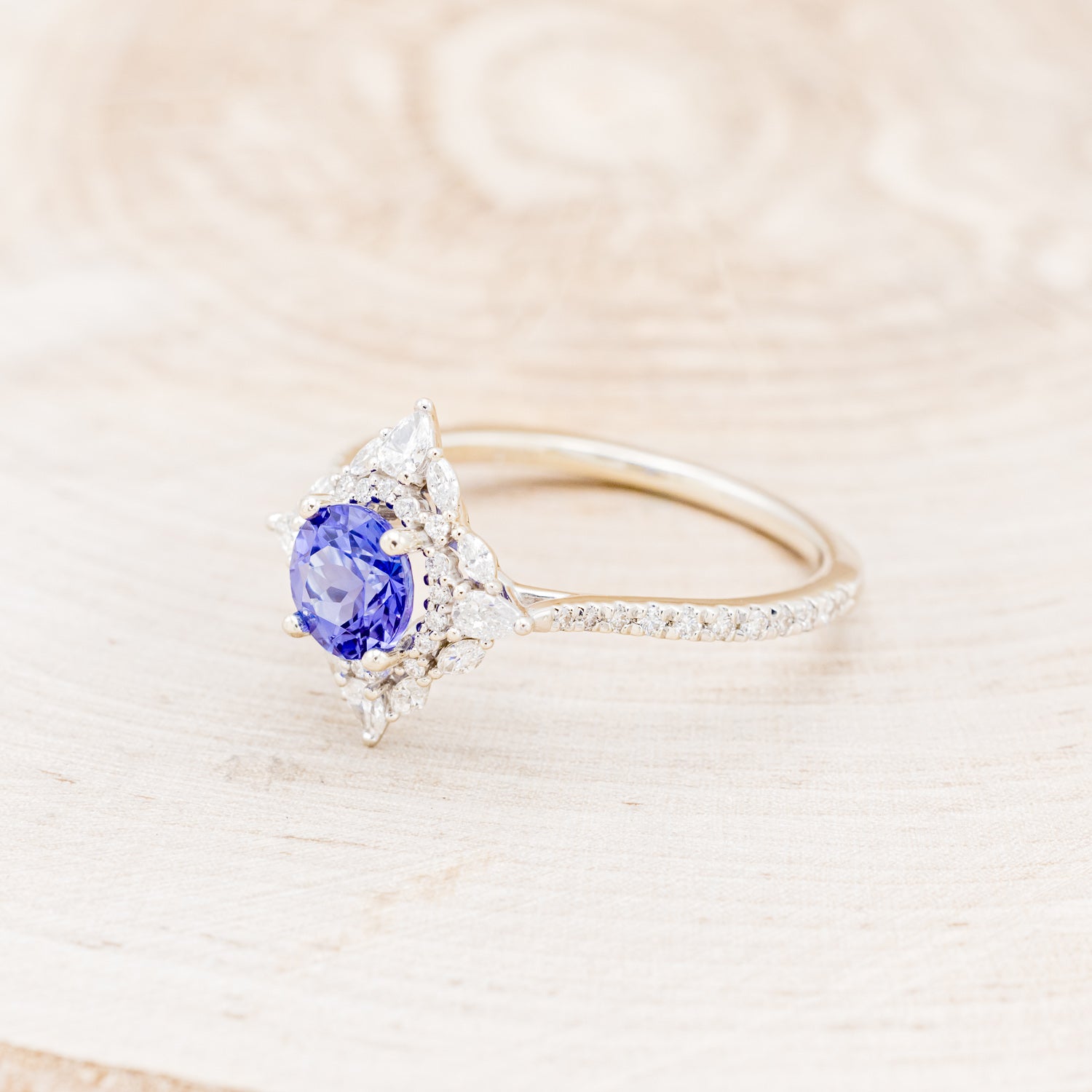 "NORTH STAR" - ROUND CUT TANZANITE ENGAGEMENT RING WITH DIAMOND ACCENTS & TRACER-8