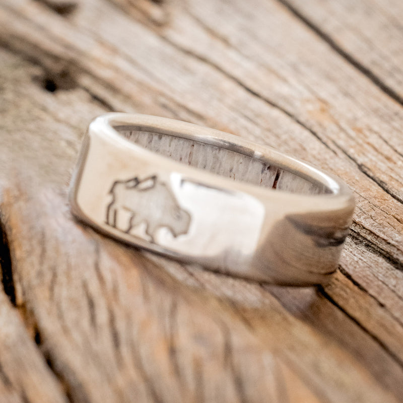CUSTOM ENGRAVED WEDDING BAND FEATURING A BISON WITH ANTLER LINING