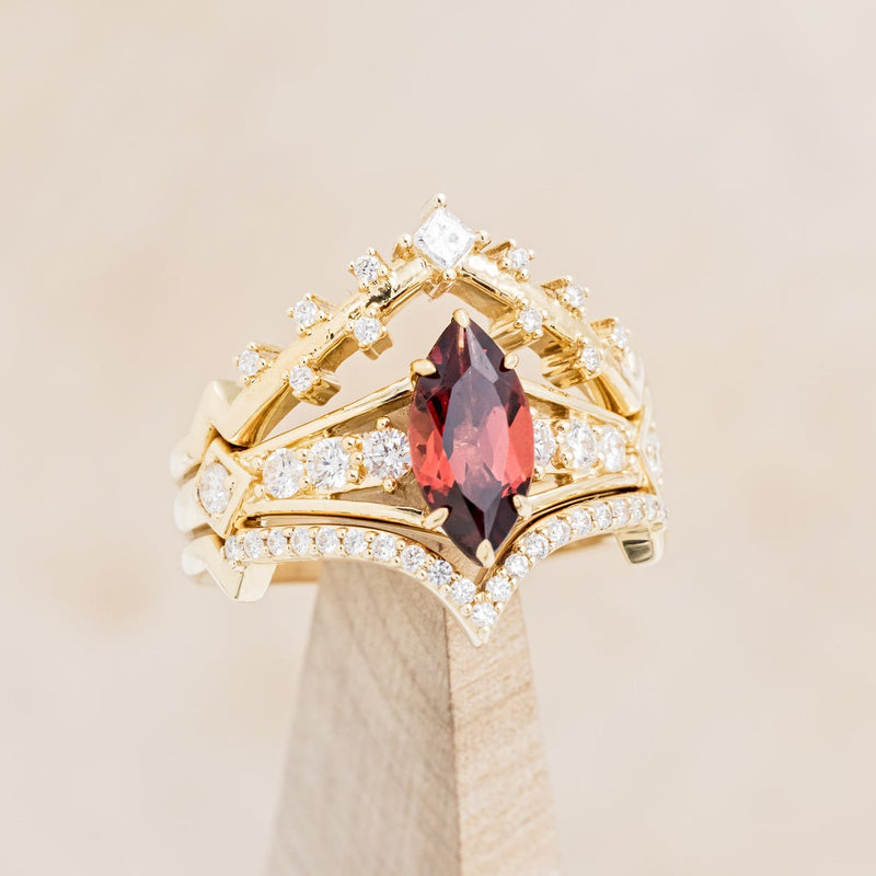"PERSEPHONE" - BRIDAL SUITE - MARQUISE-CUT MOZAMBIQUE GARNET ENGAGEMENT RING WITH DIAMOND ACCENTS & TWO DIAMOND TRACERS