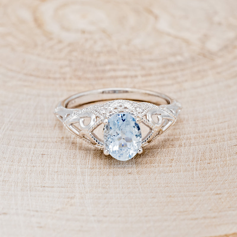 "RELICA" - OVAL AQUAMARINE ENGAGEMENT RING WITH DIAMOND ACCENTS